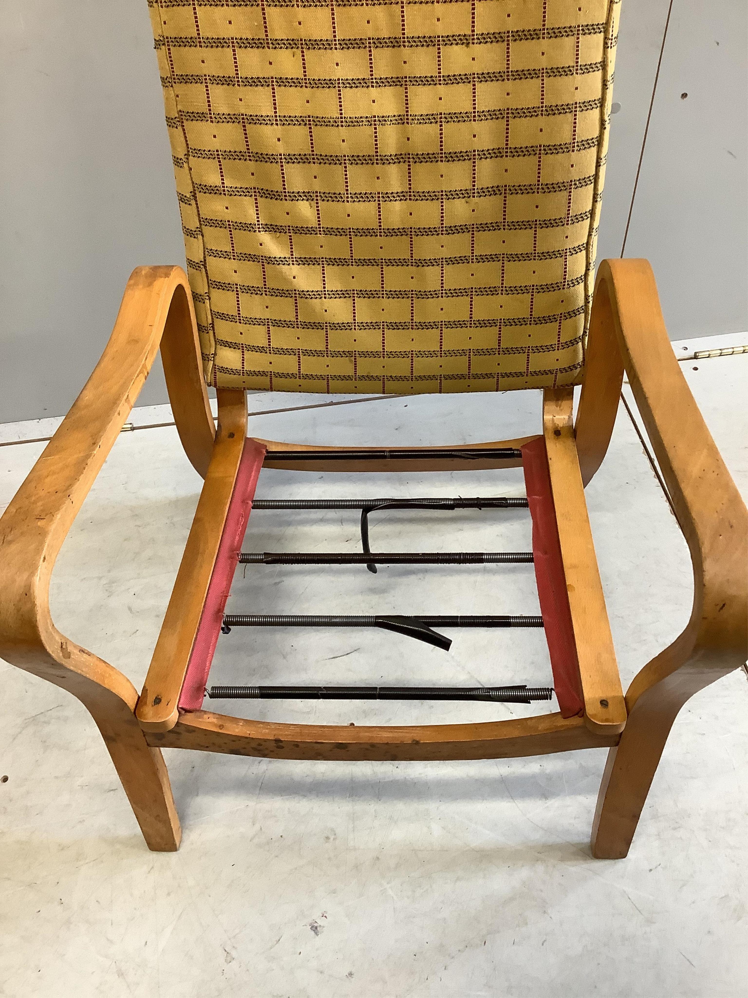 A pair of mid century Eric Lyons Tecta armchairs, width 56cm, depth 54cm, height 85cm. Condition - fair, upholstery poor